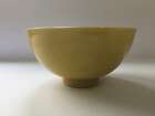 
	
		A Chinese porcelain incised yellow-glazed bowl, Kangxi mark and of the period, incised to...