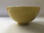 
	
		A Chinese porcelain incised yellow-glazed bowl, Kangxi mark and of the period, incised to...