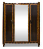 
	
		French Art Deco, a Macassar and banana wood part bedroom suite
		c.1930
		Comprising: a...