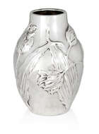 
	
		Tiffany & Co,  
		 
		Sterling repousse work vase with tulip decoration, late 20th...