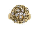 
	
		A diamond ring, by John Donald, designed as an open work textured sphere accented with...
