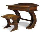 
	
		Marc Van Rampelberg (b.1949), an Iroko writing desk and stool  
		c.1986, with inlaid...