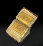 An extremely small miniature Qur’an, Qajar Iran, circa 1860, 
Unsigned and undated, 319ff.,...