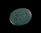 A green hardstone seal, Possibly Iran, 
 