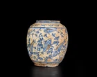 A blue, black and white pottery jar, Qajar Iran, first half 19th century, 
 On short straight...