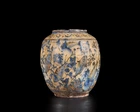 A blue, black and white pottery jar, Qajar Iran, first half 19th century, 
 On short straight...