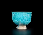 A conical turquoise blue glazed pottery bowl, Ilkhanid central Iran, 12th/13th century, 
On...