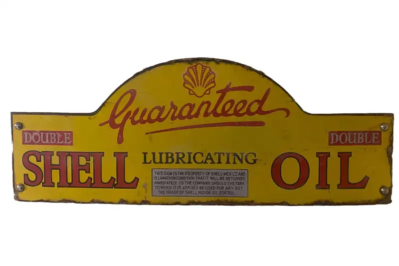 An Early 'Guaranteed Shell Lubricating Oil' Enamel Sign-Sold