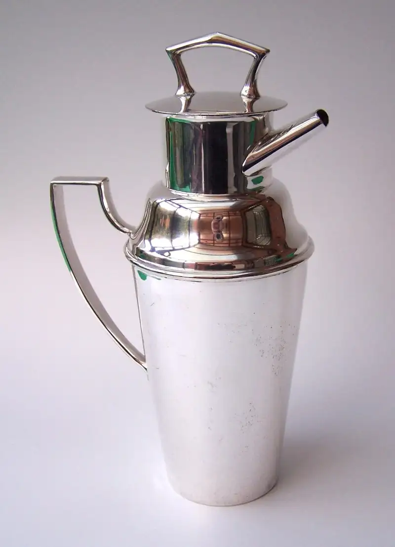 A Superb Art Deco Silver Plated Asprey Cocktail Shaker and Silver Plated Asprey Cocktail Bar Set