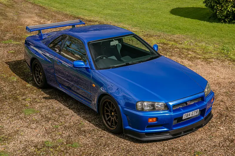 Iconic Auctioneers | 1999 Nissan Skyline R34 GT-R V-Spec I-Sold