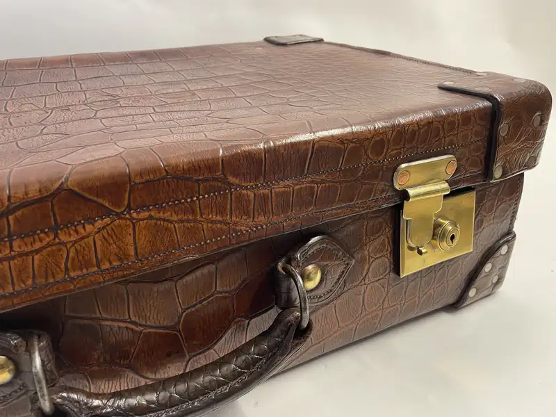 A Large Crocodile Skin Suitcase/Trunk Bearing the Initials  A.C.G.