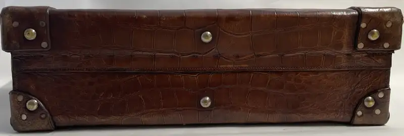 A Large Crocodile Skin Suitcase/Trunk Bearing the Initials  A.C.G.