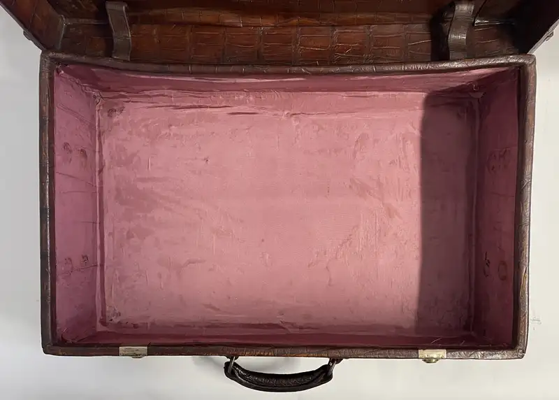 A Large Crocodile Skin Suitcase/Trunk Bearing the Initials  A.C.G.
