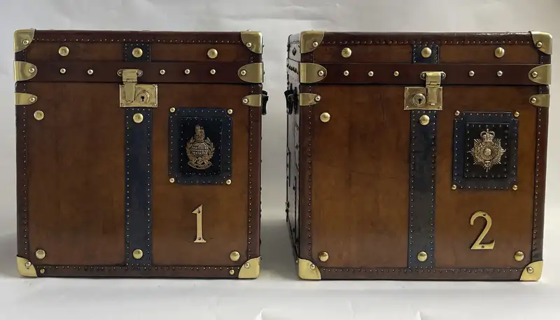 A Pair of Substantial Army and Navy Steamer Trunks-Sold