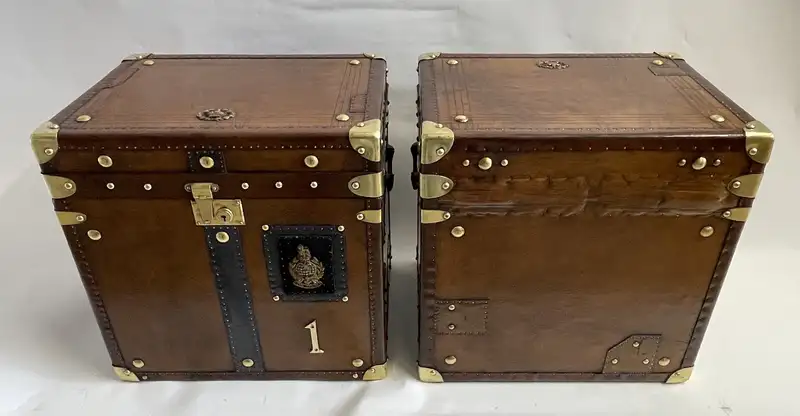 A Pair of Substantial Army and Navy Steamer Trunks-Sold