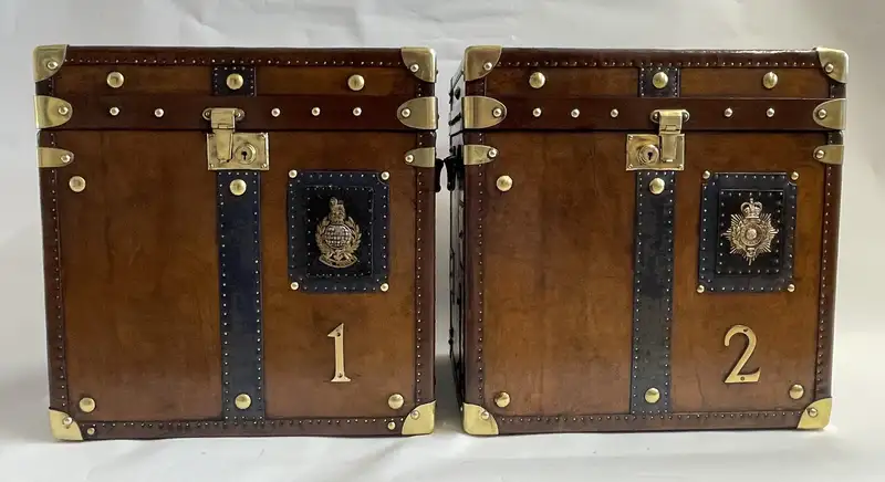 A Pair of Substantial Army and Navy Steamer Trunks-Sold