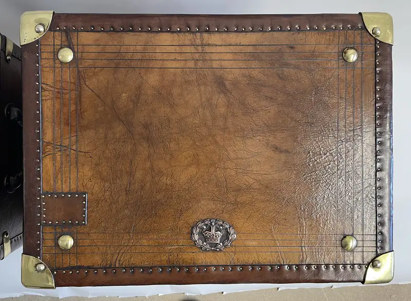 A Pair of Substantial Army and Navy Steamer Trunks-Sold
