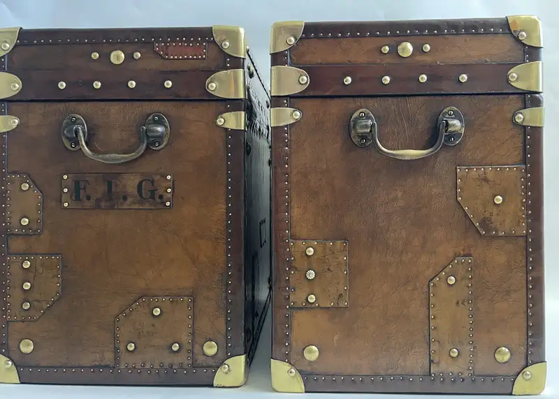 A Pair of Substantial Army and Navy Steamer Trunks-Sold