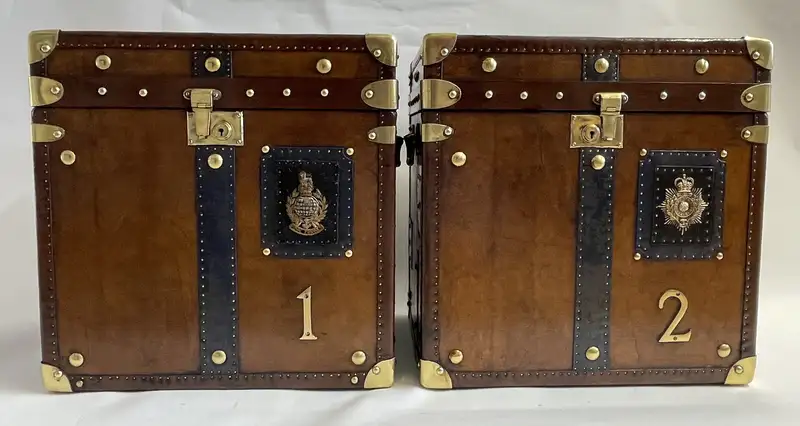 A Pair of Substantial Army and Navy Steamer Trunks-Sold