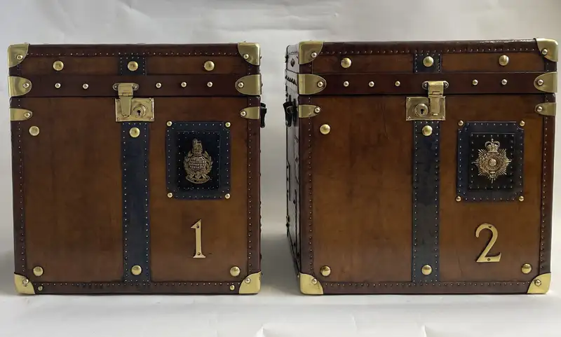 A Pair of Substantial Army and Navy Steamer Trunks-Sold