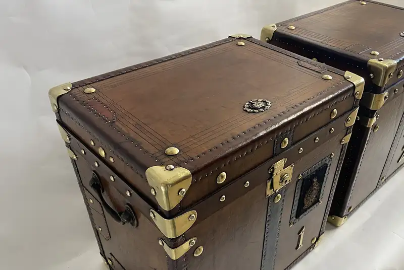 A Pair of Substantial Army and Navy Steamer Trunks-Sold