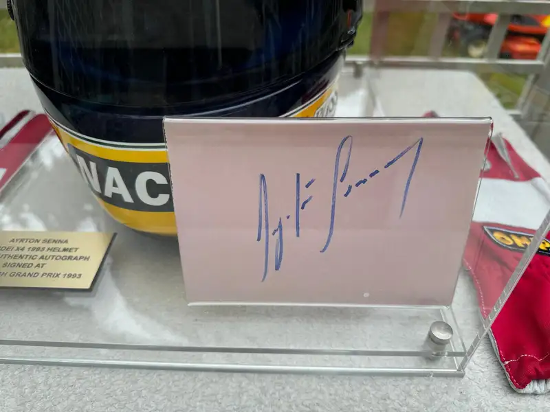 Ayrton Senna Replica Helmet, Gloves, Race Suit and His Signa-Sold