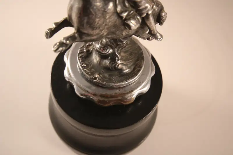 A Rare 'Boy Riding Pig' Mascot by Franz Bergmann, Austria Ci-Sold