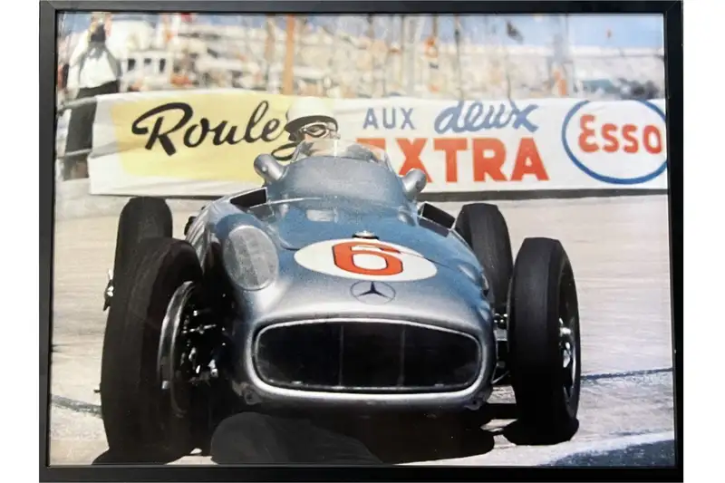 A Large Framed Image of Sir Stirling Moss at the Wheel of hi-For Sale
