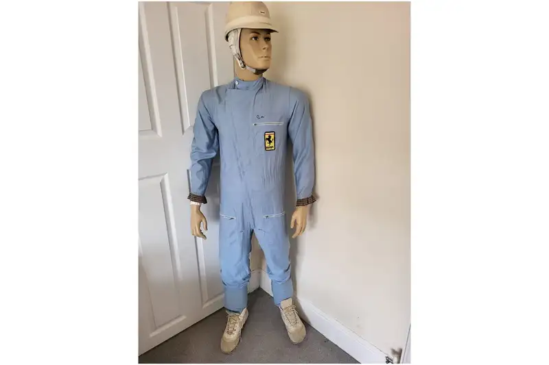 Sir Stirling Moss-Signed 'Ferrari' Race Suit and Period Helm-For Sale