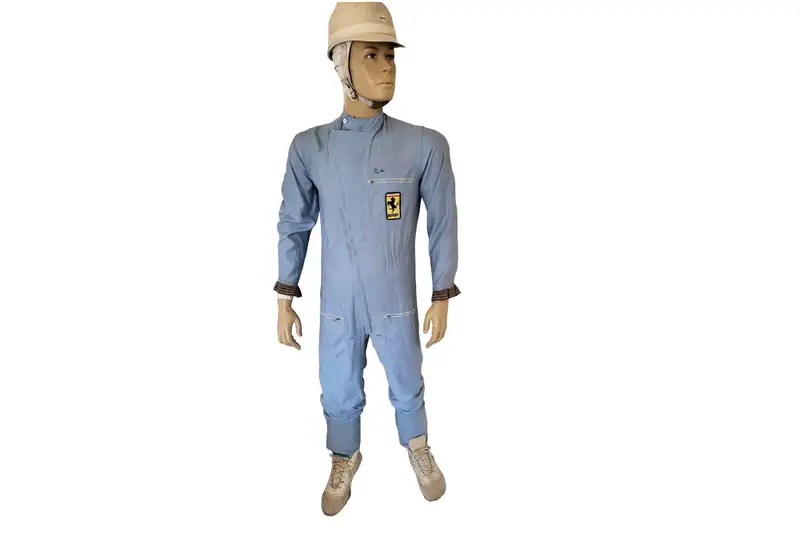 Sir Stirling Moss-Signed 'Ferrari' Race Suit and Period Helm-For Sale