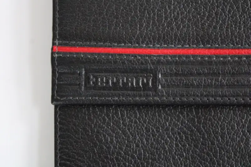 1980-1990 Ferrari Formula Cartier Leather Bifold Travel Wall-Sold