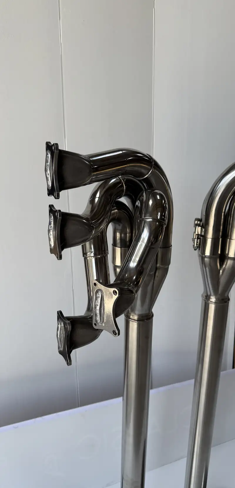 A Pair of Lamps Crafted from the Exhaust System of a Ford Co-For Sale
