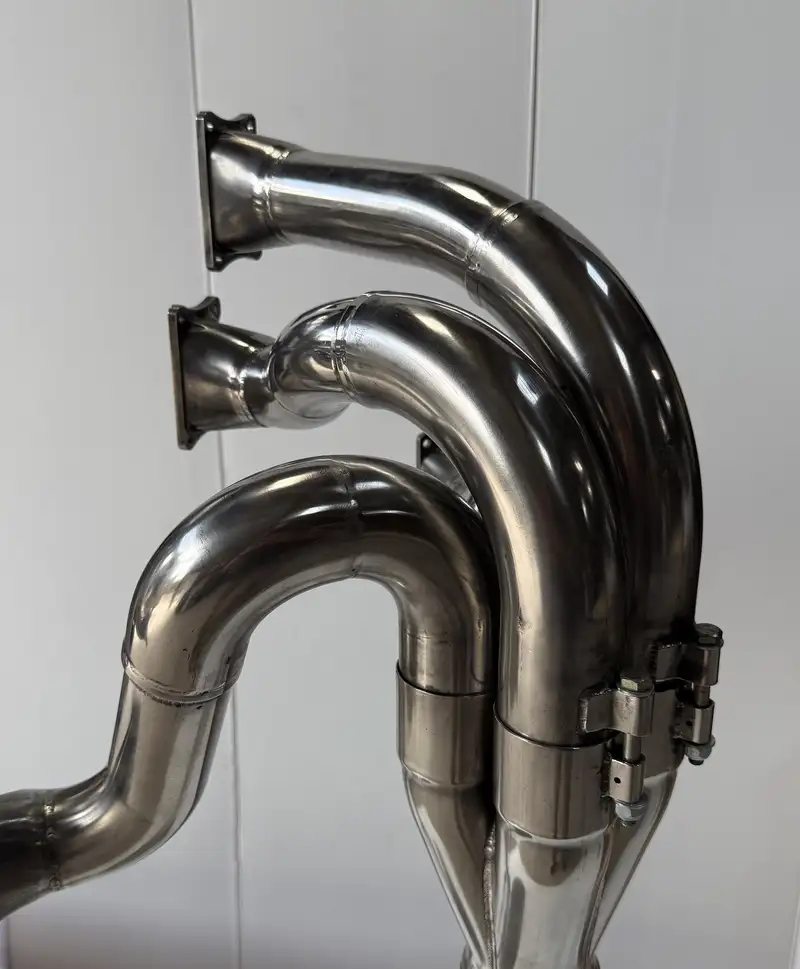 A Pair of Lamps Crafted from the Exhaust System of a Ford Co-For Sale