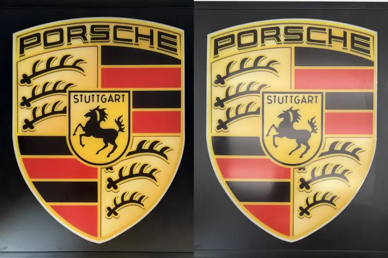 A Pair of Framed 'Porsche' Style Shields -Sold
