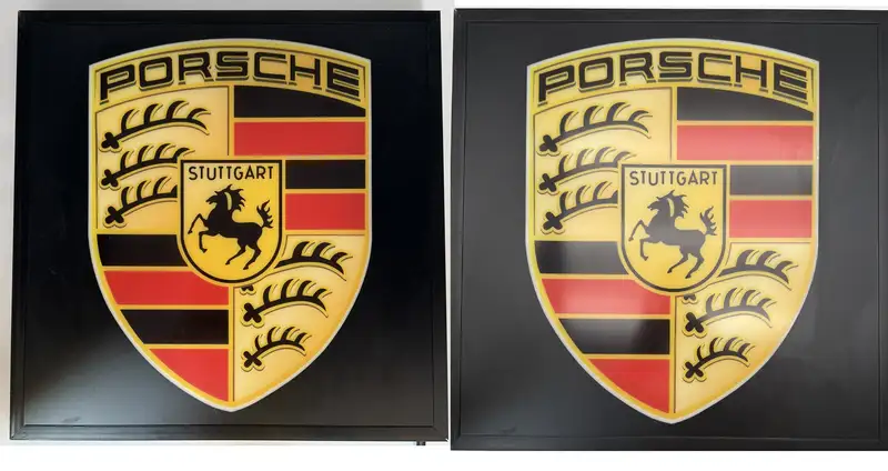 A Pair of Framed 'Porsche' Style Shields -Sold