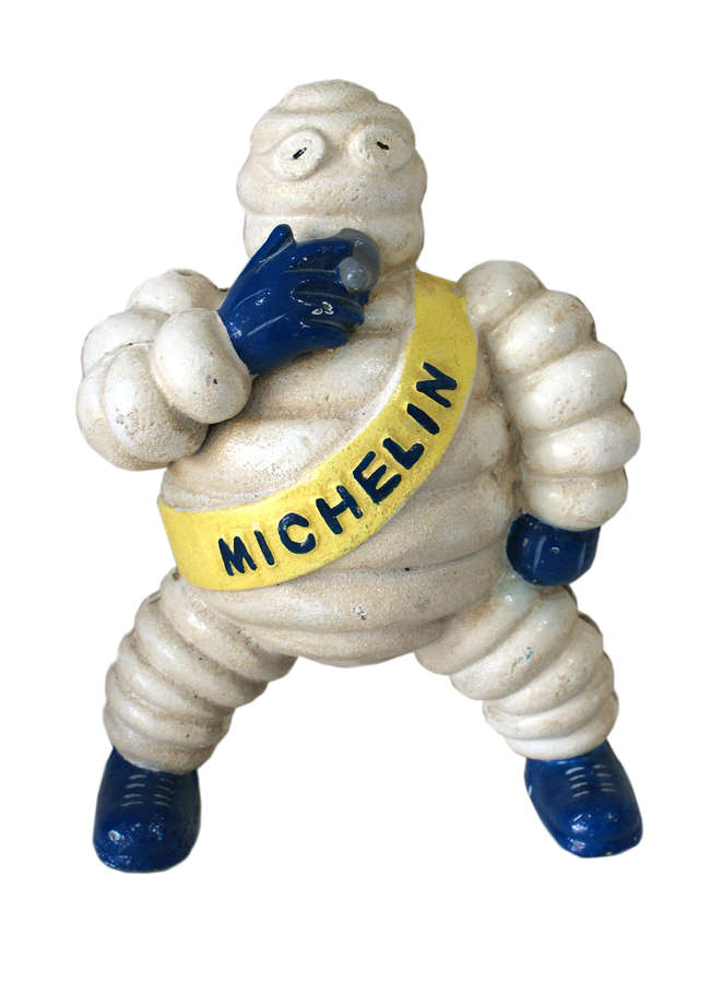Michelin Man Smoking figure. -Sold