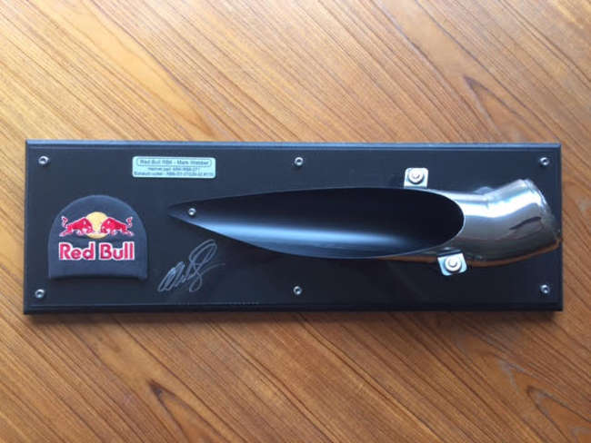 Mark Webber signed Red Bull exhaust.-Auction Lot