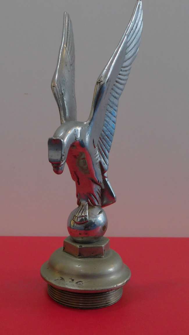 'Bird with a Ball'  bonnet mascot.-Auction Lot