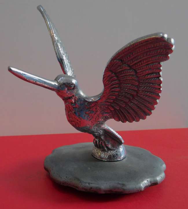 Hummingbird motoring mascot.-Auction Lot