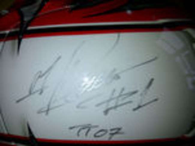 A correct and superb autographed Michael Rutter crash helmet-Auction Lot