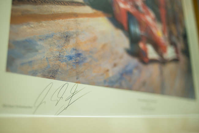 Three select framed artworks of a motoring nature-Auction Lot