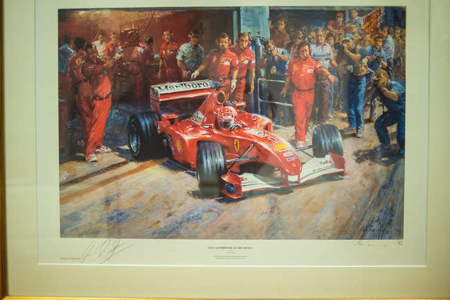 Three select framed artworks of a motoring nature-Auction Lot