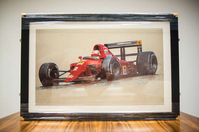 Three select framed artworks of a motoring nature-Auction Lot