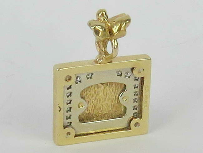 14 carat gold Rolls Royce pendant.-Sold