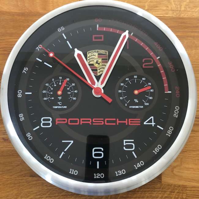 A Porsche wall clock with dashboard design -Sold