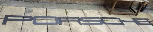 A font-correct 'Porsche' hanging wall sign-Sold