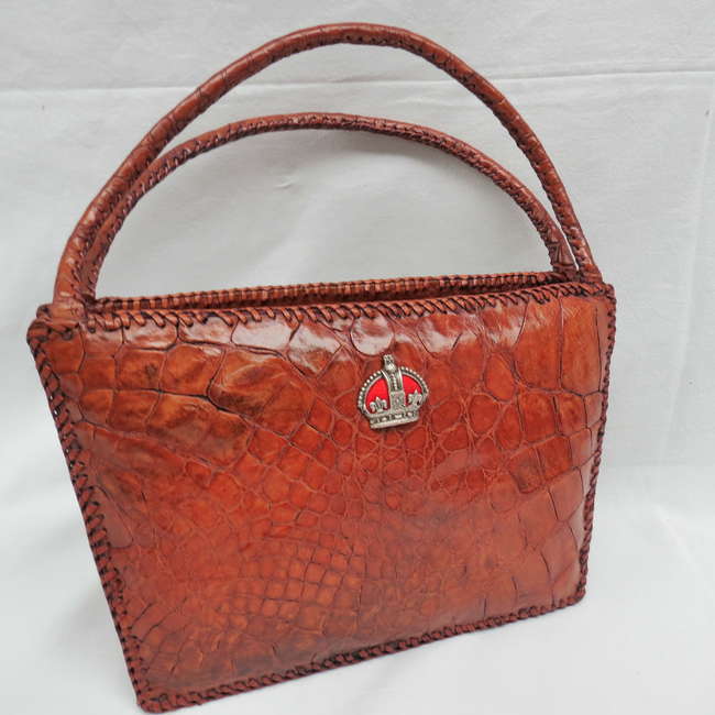A crocodile skin handbag with George VI crown motif c 1950's-Sold