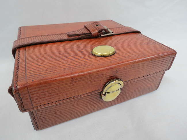 Small leather box with brass clasp-Sold