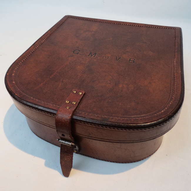 A small leather bow fronted Lift Top Box-Auction Lot
