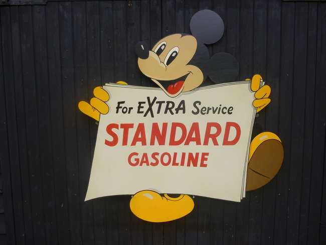 Micky Mouse Gasoline advertising board.-Sold